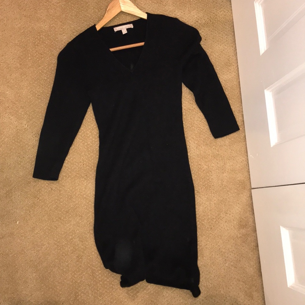 Tight black v-neck dress